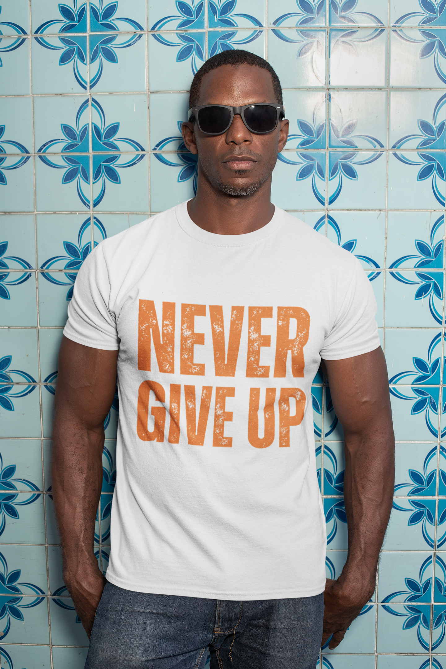 t-shirt-mockup-of-a-man-with-sunglasses-against-a-blue-tiling-30449